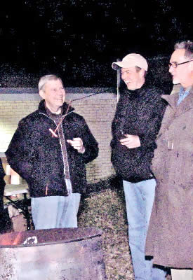 Cary with Randy Moore and Frank Messer warmed by the reception of the park plan and bonfire at the presentation of the Roanoke Park Plan. -December 2, 2010. Westport Roanoke Community Center